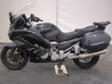 a motorcycle that is parked in a garage