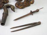 a lot of tools that are sitting on a table