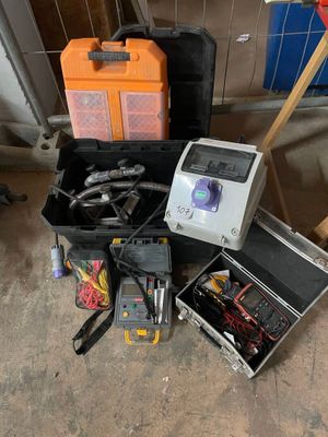 many different types of electrical equipment on the floor