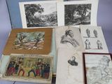 some old books are sitting on a table with pictures on them