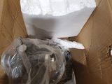 a cardboard box that has a bunch of items inside of it