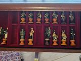 a display case with a lot of figurines in it