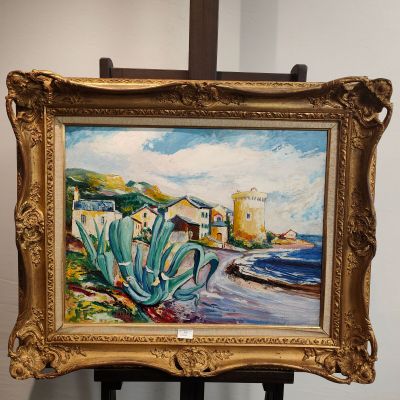 une image d'un tableau sur un chevalet dans une pièce