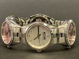 a close up of a wrist watch on a table