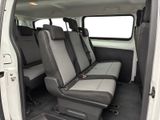 a white van with four seats in the back of it