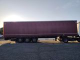 a large semi truck that is parked in a lot