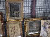 many framed pictures of women on display in a room