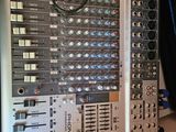 an image of a sound board with a lot of knobs on it