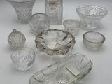 a lot of glass items that are on the table