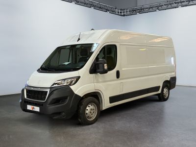 a picture of a white van parked in a garage