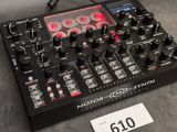 a close up of a mixer on a table with a price tag in front of it