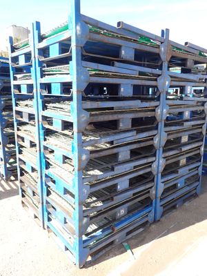 several pallets are stacked on top of each other in a warehouse