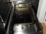 an image of a commercial kitchen with a deep fryer