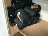 a closet with a lot of clothes on the shelves