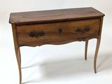 an image of a small wooden table with two drawers on it