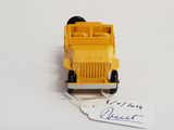 a yellow toy truck with a price tag attached to it