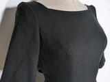 the back of a black dress on a mannequin mannequin mannequin mannequin mannequin mannequin mannequin mannequin