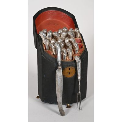 silverware in a black case with forks and spoons in it