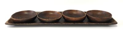 three wooden bowls on a tray with a white background