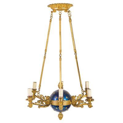 an image of a blue and gold chandelier hanging from a ceiling