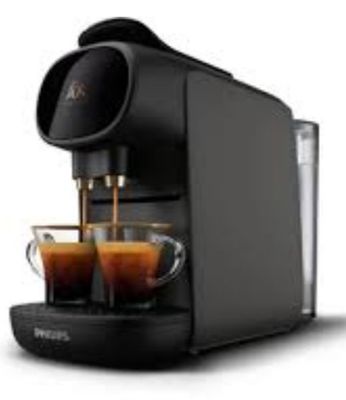 a close up of a coffee machine with two cups of coffee