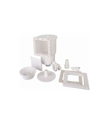 une photo de toilettes blanches équipées d'un lavabo et d'un distributeur de papier toilette