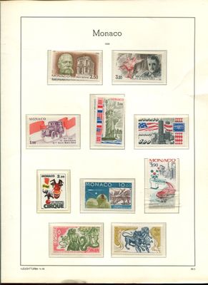 une vieille photo représentant une collection de timbres sur laquelle figurent un homme et une femme
