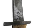 a close up of a knife with a wooden handle