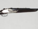 a close up of a gun on a white background