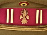 an image of a military hat with a badge on it