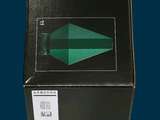 a black box with a green and white design on it