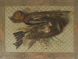 un tableau représentant un oiseau et un nid d'oiseau posés sur une table