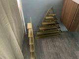a picture of a bathroom with a wooden shelf and a toilet