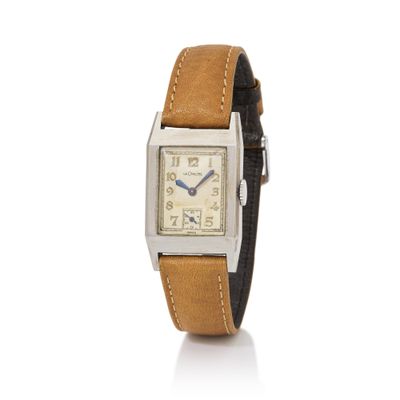 a close up of a watch on a white surface with a white background
