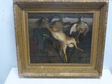 une photo d'un tableau représentant un cerf, dans un cadre doré