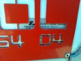 a close up of a sign on the side of a bus