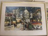 two framed paintings of a street scene with people walking down the street