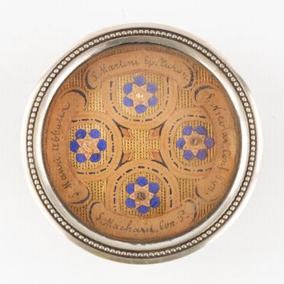 a picture of a clock that is on a white surface