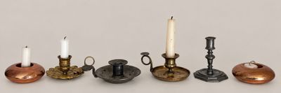 five different types of candles on the table