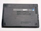 a close up of a laptop with the bottom panel missing