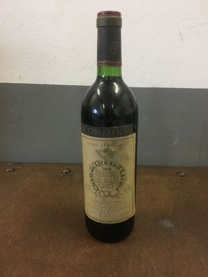 a bottle of wine that is sitting on a table