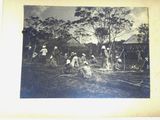 an old black and white photo of a group of men working in a field