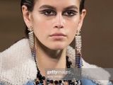a model walks the runway at the fashion show during fashion week