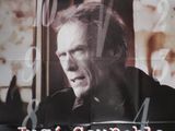 affiche de cinéma représentant un homme avec une cigarette devant une fenêtre
