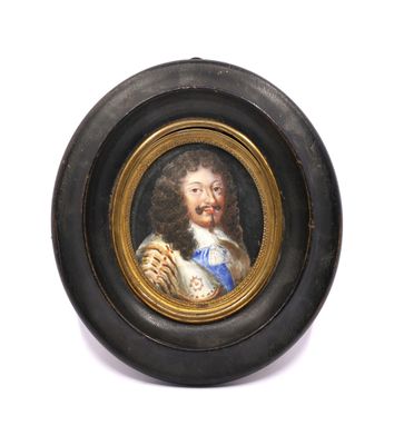an old picture of a man with a beard in a black oval frame