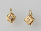 an image of a pair of gold and pearl earrings