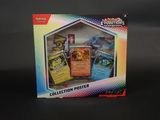La boîte contient une collection de cartes Pokémon exposées.