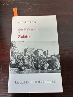 a book that is sitting on a table next to a cup of coffee