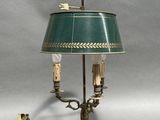 an image of a table lamp with a green shade on top of it