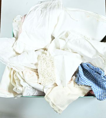 a box full of clothes that is sitting on a table